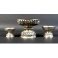 A group of three graduated Cambodian Khmer silver pedestal bowls, the largest decorated with quatref... 