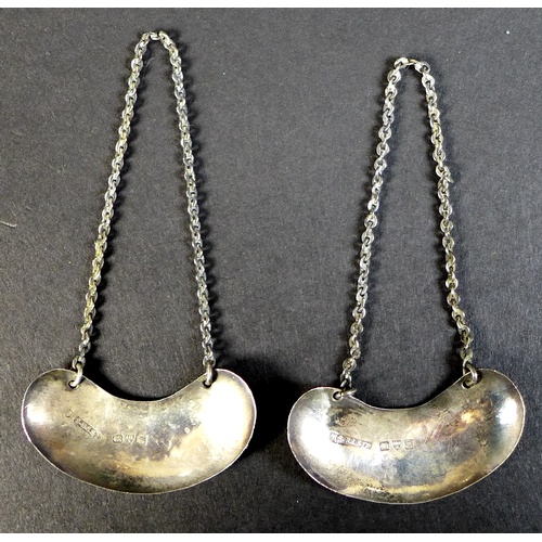 42 - A pair of Edwardian clear glass and silver mounted noggin flasks, each of tapering form with mounted... 