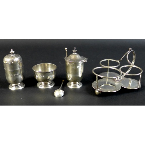 32 - Two silver cruet sets, a Victorian silver set with pepper salt, mustard and pepper pot with trefoil ... 