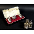 Two silver cruet sets, a Victorian silver set with pepper salt, mustard and pepper pot with trefoil ... 