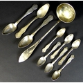 A group of German silver spoons, late 19th century, comprising a ladle, 5.75toz, 35cm long, and a se... 