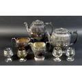 An Art Deco silver plated four piece tea and coffee service, comprising coffee pot complete with ori... 