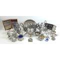 A collection of silver plated wares, including a Victorian egg cup stand with six egg cups, 20cm dia... 