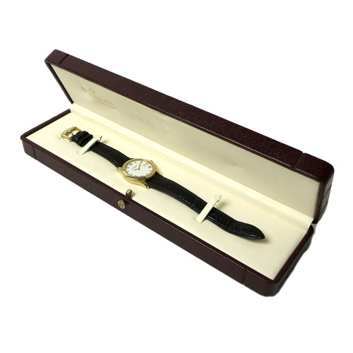 96 - A Patek Philippe Calatrava 18k gold cased lady's wristwatch, reference 4906, circa 2006, the circula... 