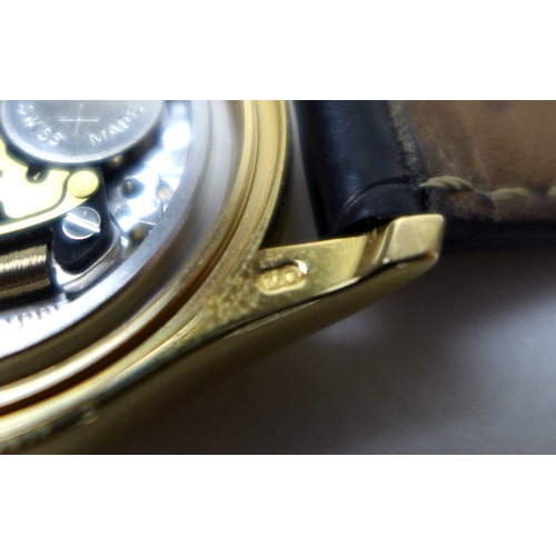 96 - A Patek Philippe Calatrava 18k gold cased lady's wristwatch, reference 4906, circa 2006, the circula... 