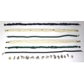 A group of six beaded necklaces, comprising two freshwater pearl seven stranded chokers, one with ga... 