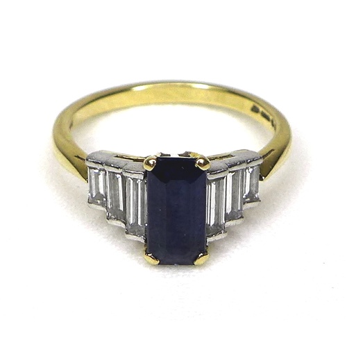 151 - An Art Deco style 18ct gold, sapphire and diamond ring, with raised platinum setting, the central bl... 