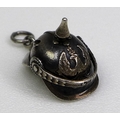 A silver novelty charm, early to mid 20th century, in the form of a WWI German Pickelhaube, finely m... 