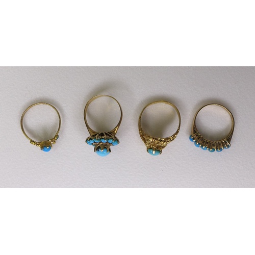 132 - A group of four Middle Eastern gold rings, of varying designs but all set with turquoise, each unmar... 