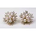 A pair of vintage 9ct yellow gold and pearl ear clips, of sunburst form centred by a cluster of six ... 