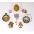 A small group of jewellery, comprising a pendant necklace, possibly Chinese, in the form of a orb pa... 