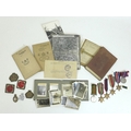 A collection of WWII ephemera belong to Sergeant J. T. Drake, comprising a field message book contai... 