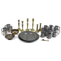 A collection of brass and pewter items, comprising two pewter dishes, 42cm and 35cm, a group of four... 