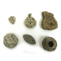 A collection of six detectorist finds, comprising two lead medieval seal matrixes, 3 by 0.6cm by 3.7... 