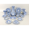 A collection of Wedgwood Jasperware, mostly in blue and white, including a teapot, 15cm high, a balu... 
