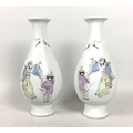 A pair of Chinese early 20th century famille rose porcelain vases, of inverted baluster form with fl... 
