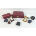 A collection of jewellery boxes, including two jewellery cases with gilt tooled red leatherette, a b... 