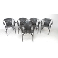 A set of five modern wrought metal and lattice conservatory armchairs, dark lacquered finish with sc... 