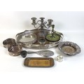A group of silver plated items, including an oval twin handled tray with pierced gallery, 52 by 36 b... 