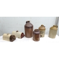 A group of stoneware jugs, including an S. Wright & Co brewery jug, 16cm diameter, 31cm high, and tw... 