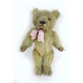 A circa 1930s Chad Valley blonde teddy bear, with 'Hygenic Toys Chad Valley' label to underside of l... 