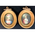 A pair of miniature portraits,  late 20th century, each of oval form, half length, each depicting a ... 