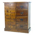 A modern Laura Ashley chest of drawers, with an arrangement of eight shallow drawers to the left and... 