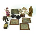 A group of South East Asian collectables, comprising a Chinese soapstone carving of a fisherman, 18c... 