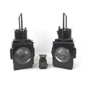 A pair of black British Rail lamps, both in black, with magnified lenses, each 20 by 24 by 45cm high... 