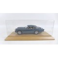 A limited edition Danbury Mint 1:24 scale 1964 Aston Martin DB5, in dark blue, numbered 3020/5000, w... 