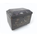 A 19th century chinoiserie tea caddy of sarcophagus form, with mother of pearl inlaid floral and rel... 