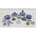 A collection of fourteen 19th century Chinese and Japanese porcelain lids, including mostly Chinese ... 