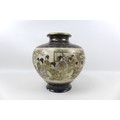 A Japanese Satsuma vase, Meiji period, with possible baluster form decorated with a single panoramic... 