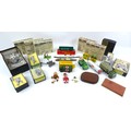 A group of military die-cast model toys, including a Dinky Military Ambulance (626), a Britains Brit... 