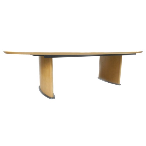 157 - A large modern Sven Christiansen oval conference table, with two pedestal supports, 300 by 150 by 75... 