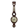 A Victorian mahogany wheel barometer, with boxwood and ebony strung inlays, silvered dial, with leve... 