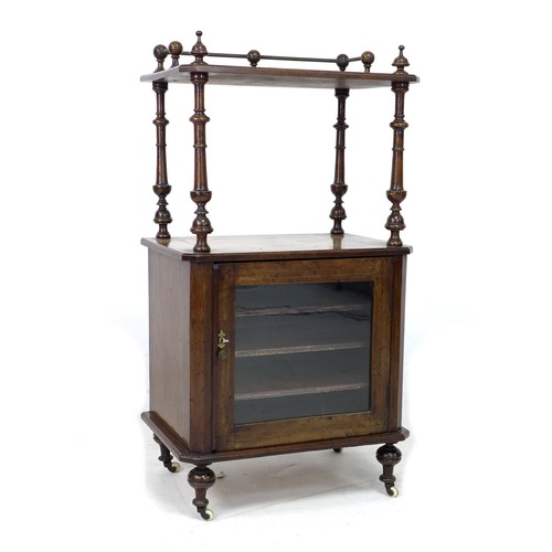 216 - A Victorian walnut music cabinet, with stainwood and ebony inlaid decoration to upper  tiers, turned... 