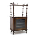A Victorian walnut music cabinet, with stainwood and ebony inlaid decoration to upper  tiers, turned... 