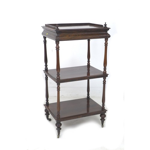 218 - A Victorian rosewood three tier whatnot, with plain 3 quarter gallery and single drawer to top, turn... 