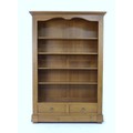 A modern French oak veneered freestanding bookcase, with four adjustable shelves and two drawers bel... 