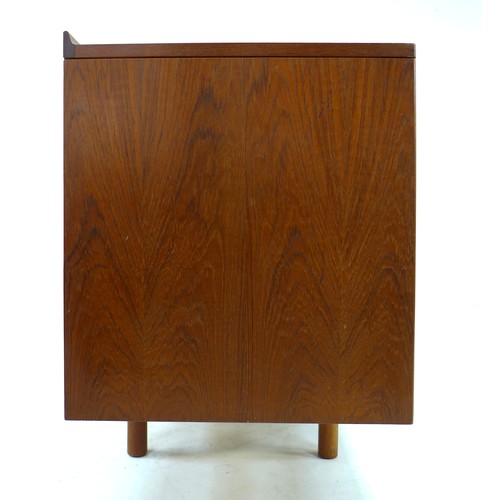 188 - A British teak sideboard, Robert Heritage for Archie Shine, of long low form with small shaped upsta... 