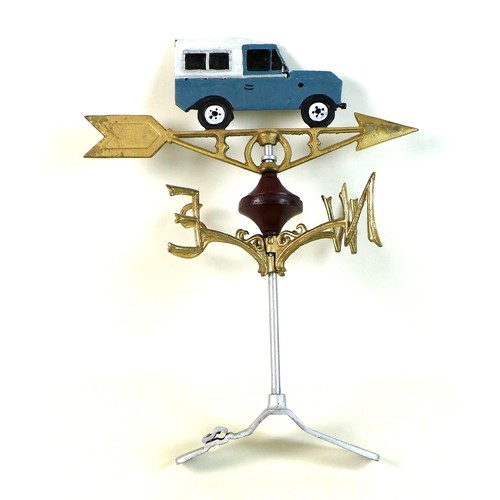 135 - A modern cast iron weather vane, painted metal, with Land Rover Defender shaped ornament, and gold c... 