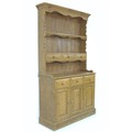 A modern small pine dresser, with plate rack above three drawers and three doored cupboard, 107 by 4... 