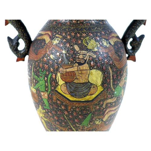 24 - A Kashmiri papier maché vase, early 20th century, of baluster form with twin dragon handles, depicti... 