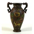 A Kashmiri papier maché vase, early 20th century, of baluster form with twin dragon handles, depicti... 