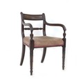 A Regency mahogany open armchair, with spiral carved mid rail, line carved decoration, pink velvet s... 