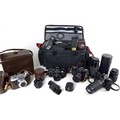 A collection of four cameras and accessories, including three Asahi Pentax cameras, an S1a with Taku... 