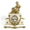 A late 19th century French alabaster and gilt metal figural mantel clock, adorned with female figure... 