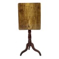 A Victorian mahogany tilt top table, with rectangular top, turned column with tripod base, 51 by 43 ... 