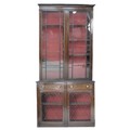 A 19th century rosewood veneered bookcase, in Arts & Crafts style, the upper section with plain corn... 